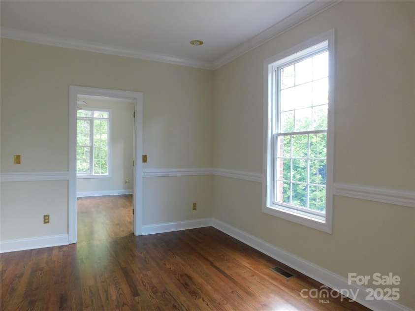 1064 Skye Drive, Pisgah Forest, NC 28768.  MLS# CAR4238839, YatesRealty ID 14202. Part of the primary suite, picture a private sitting room, library, or office.