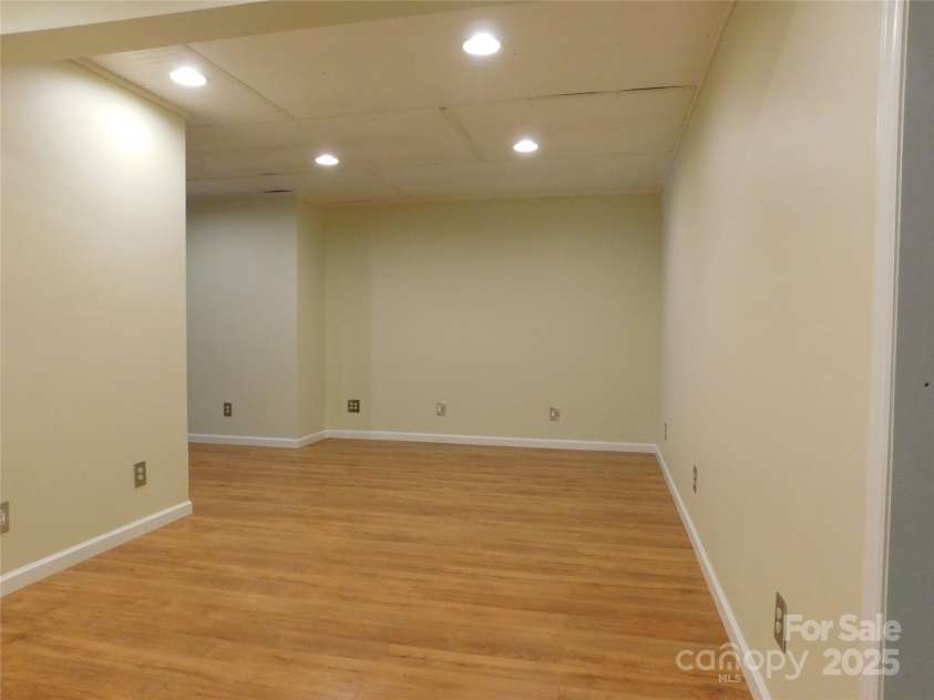 1064 Skye Drive, Pisgah Forest, NC 28768.  MLS# CAR4238839, YatesRealty ID 14202. Possible movie room, craft/hobby room.