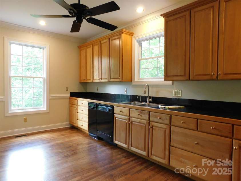 1064 Skye Drive, Pisgah Forest, NC 28768.  MLS# CAR4238839, YatesRealty ID 14202. This kitchen has storage galore!
