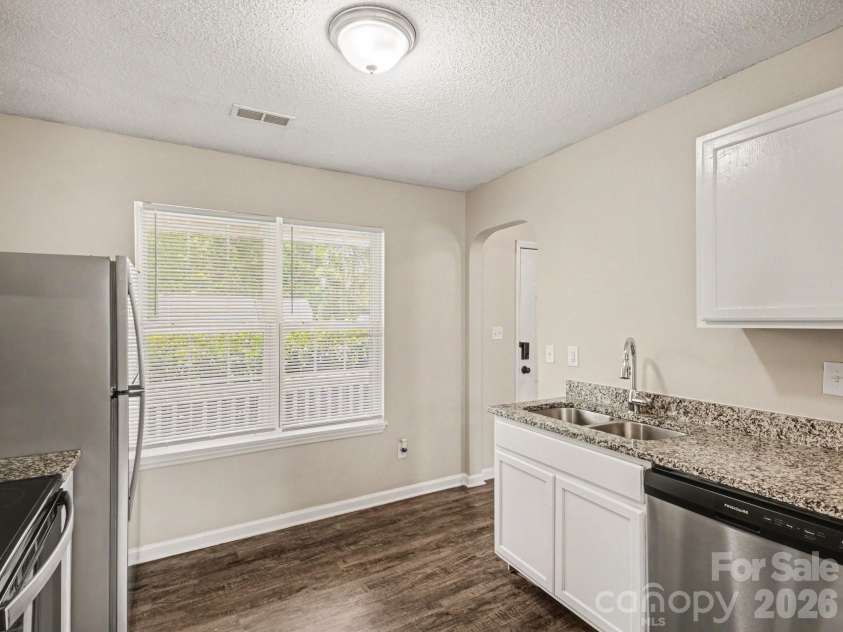 3744 Capps Hill Drive, Charlotte, NC 28216.  MLS# CAR4371756, YatesRealty ID 14203. 