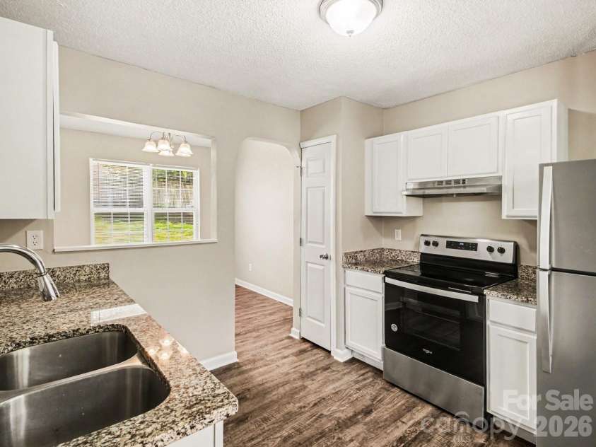 3744 Capps Hill Drive, Charlotte, NC 28216.  MLS# CAR4371756, YatesRealty ID 14203. 