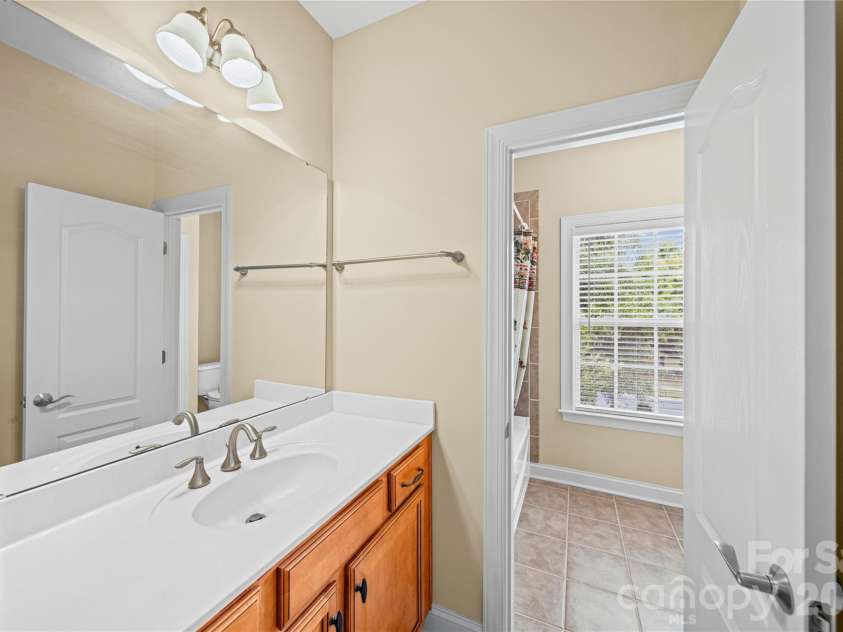 8734 Savannah Road, Harrisburg, NC 28075.  MLS# CAR4371873, YatesRealty ID 14204. Dual Access Bath