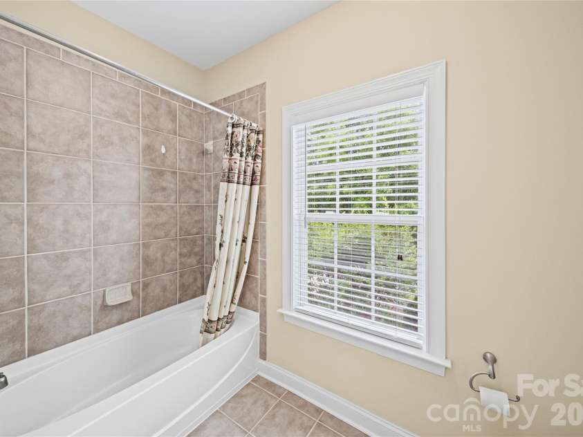 8734 Savannah Road, Harrisburg, NC 28075.  MLS# CAR4371873, YatesRealty ID 14204. Dual Access Bath