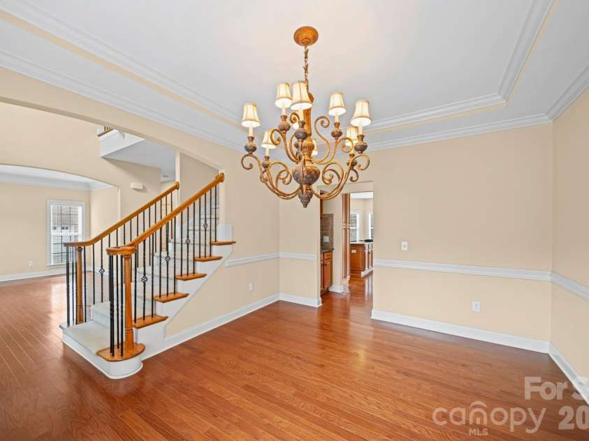8734 Savannah Road, Harrisburg, NC 28075.  MLS# CAR4371873, YatesRealty ID 14204. Formal Dining Room & Front Staircase