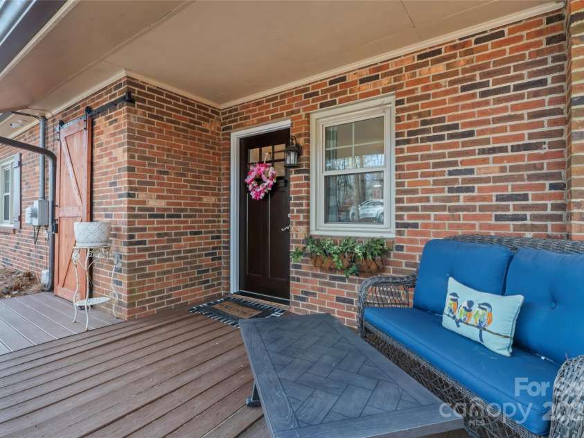 693 Emerald Shores Road, Mount Gilead, NC 27306.  MLS# CAR4225692, YatesRealty ID 14207. Front door.