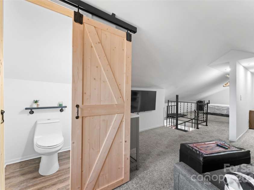 693 Emerald Shores Road, Mount Gilead, NC 27306.  MLS# CAR4225692, YatesRealty ID 14207. Half bath upstairs.