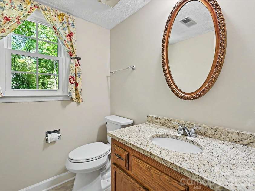 8242 Charles Crawford Drive, Charlotte, NC 28269.  MLS# CAR4371722, YatesRealty ID 14208. 