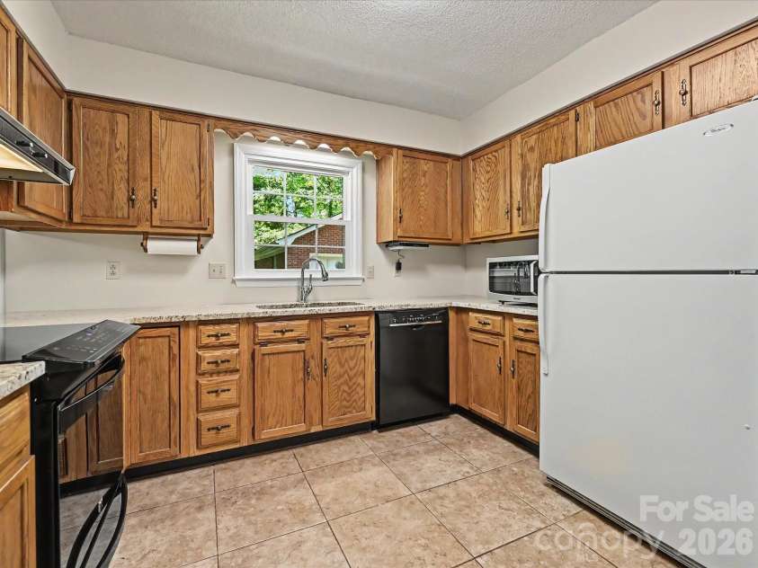 8242 Charles Crawford Drive, Charlotte, NC 28269.  MLS# CAR4371722, YatesRealty ID 14208. 