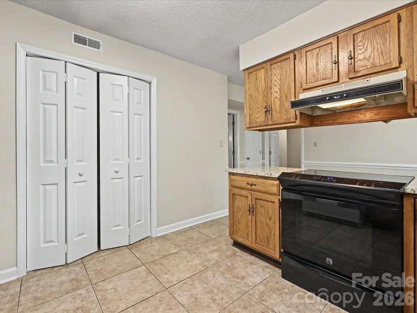 8242 Charles Crawford Drive, Charlotte, NC 28269.  MLS# CAR4371722, YatesRealty ID 14208. 