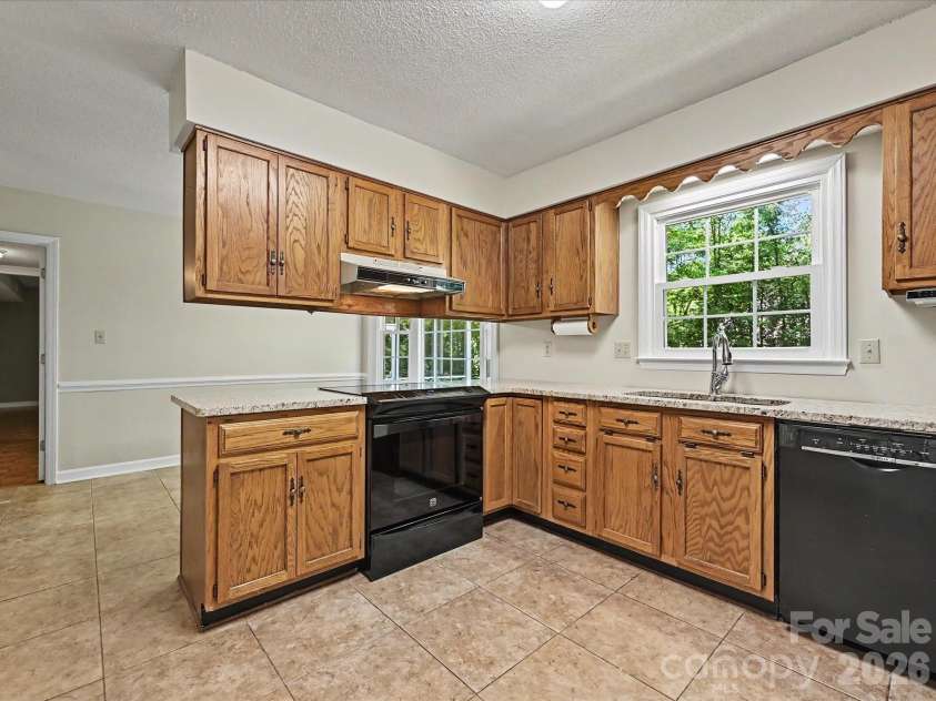 8242 Charles Crawford Drive, Charlotte, NC 28269.  MLS# CAR4371722, YatesRealty ID 14208. 