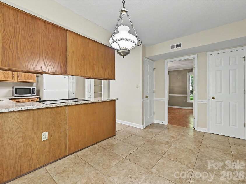 8242 Charles Crawford Drive, Charlotte, NC 28269.  MLS# CAR4371722, YatesRealty ID 14208. 