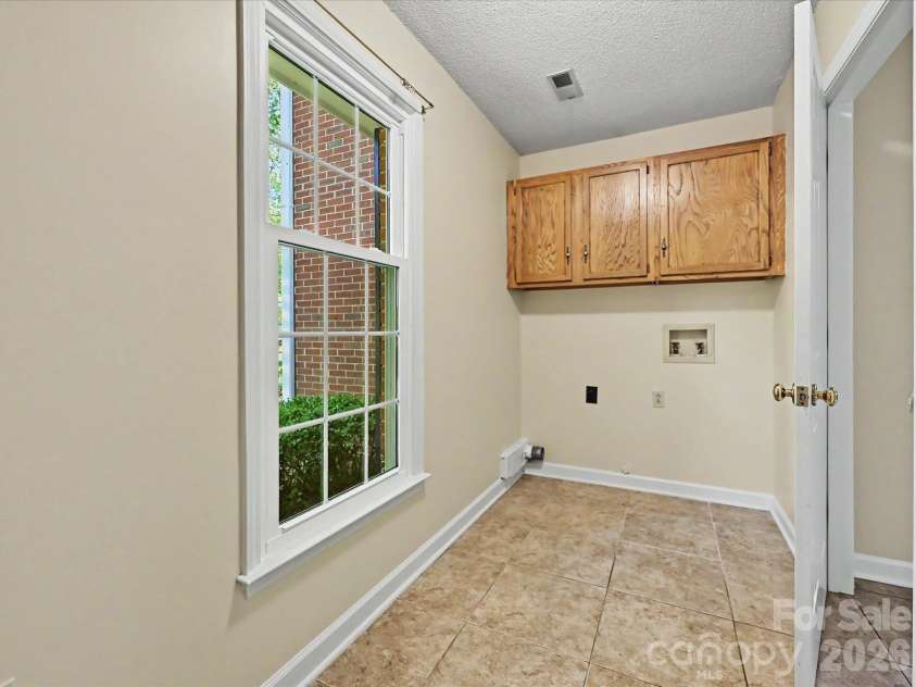 8242 Charles Crawford Drive, Charlotte, NC 28269.  MLS# CAR4371722, YatesRealty ID 14208. 