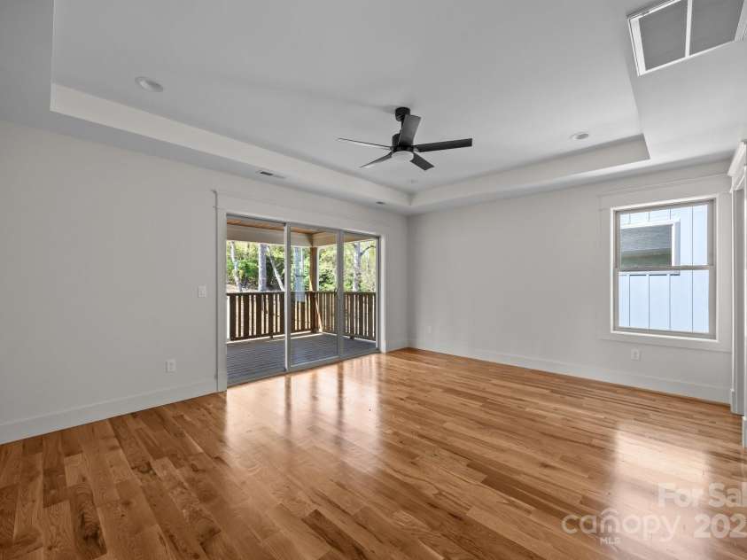 93 Glendale Avenue, Asheville, NC 28803.  MLS# CAR4234072, YatesRealty ID 1421. Primary bedroom with private deck