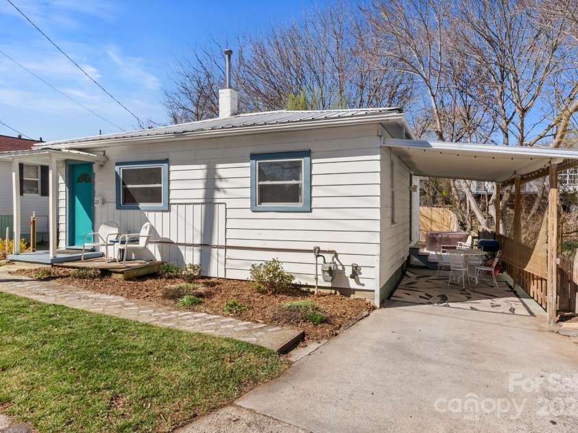 22 Jarrett Street, Asheville, NC 28806.  MLS# CAR4238160, YatesRealty ID 14210. Driveway and Carport