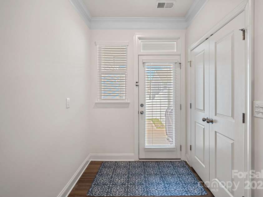 208 Waterlynn Ridge Road, Mooresville, NC 28117.  MLS# CAR4199970, YatesRealty ID 1422. Pantry and Door to back porch