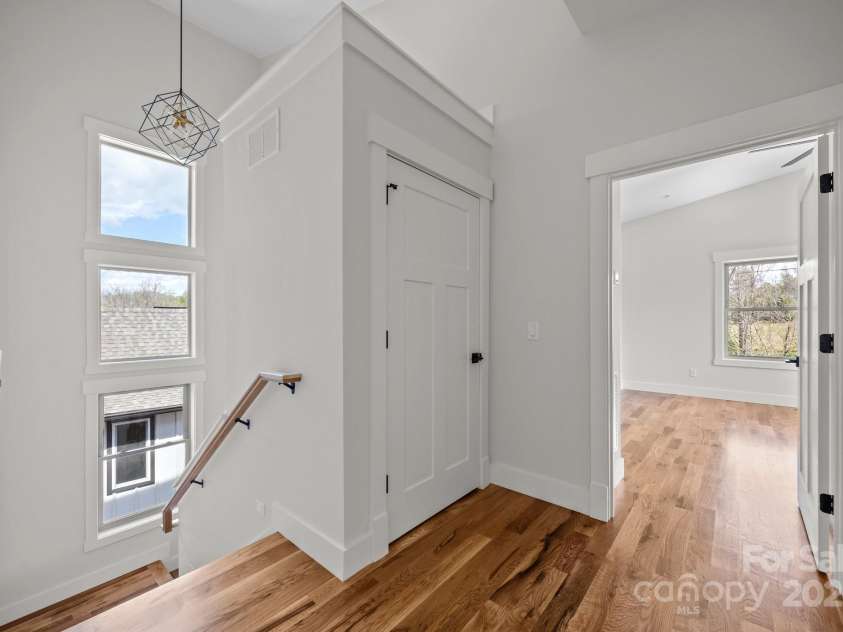 91 Glendale Avenue, Asheville, NC 28803.  MLS# CAR4233541, YatesRealty ID 1422. Washer and dryer closet located on the upper level