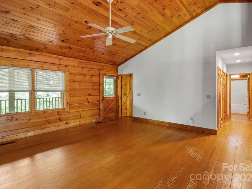 447 Cherokee Circle, Tryon, NC 28782.  MLS# CAR4315695, YatesRealty ID 14222. Living Area off front door and coming from dining room