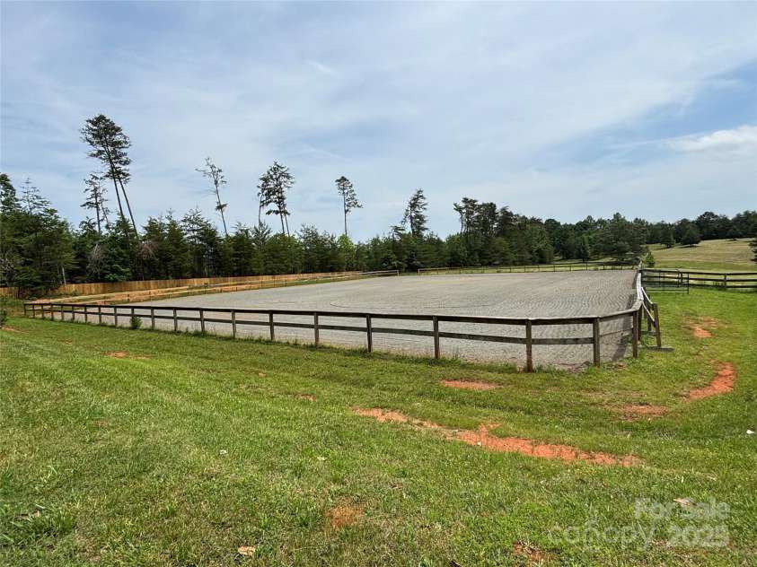 1896 Green Creek Drive, Tryon, NC 28782.  MLS# CAR4258219, YatesRealty ID 14223. 150'X200' Arena