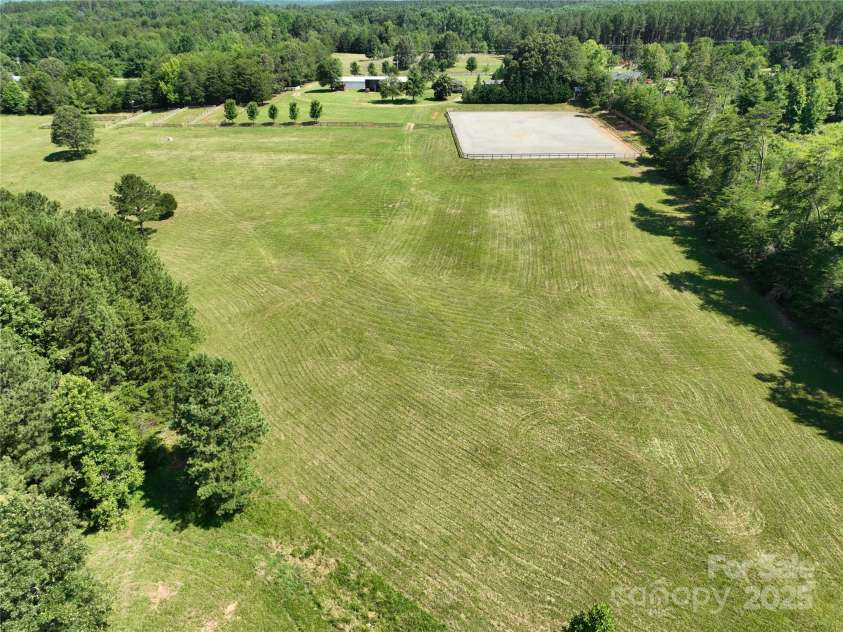 1896 Green Creek Drive, Tryon, NC 28782.  MLS# CAR4258219, YatesRealty ID 14223. Huge amount of pastures