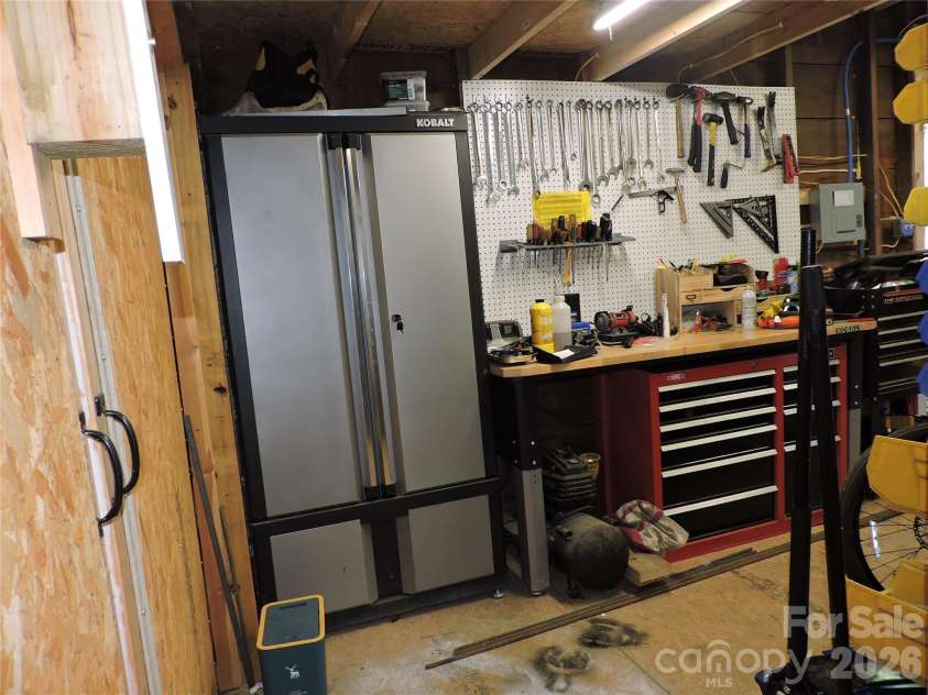 4 Carter Road, Weaverville, NC 28787.  MLS# CAR4373201, YatesRealty ID 14227. Inside workshop