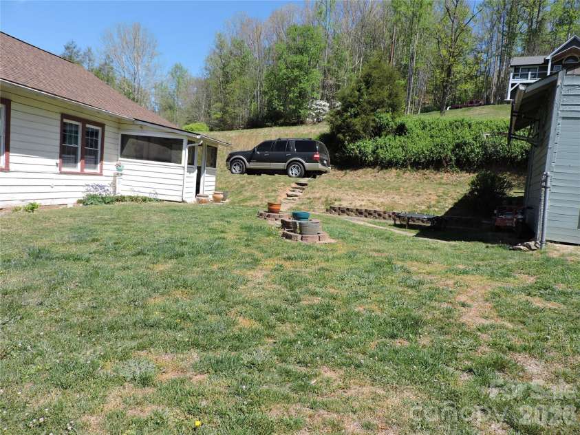 4 Carter Road, Weaverville, NC 28787.  MLS# CAR4373201, YatesRealty ID 14227. Side view