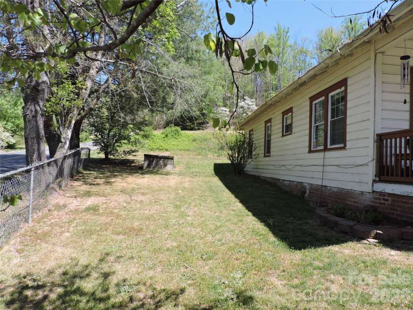 4 Carter Road, Weaverville, NC 28787.  MLS# CAR4373201, YatesRealty ID 14227. Side view