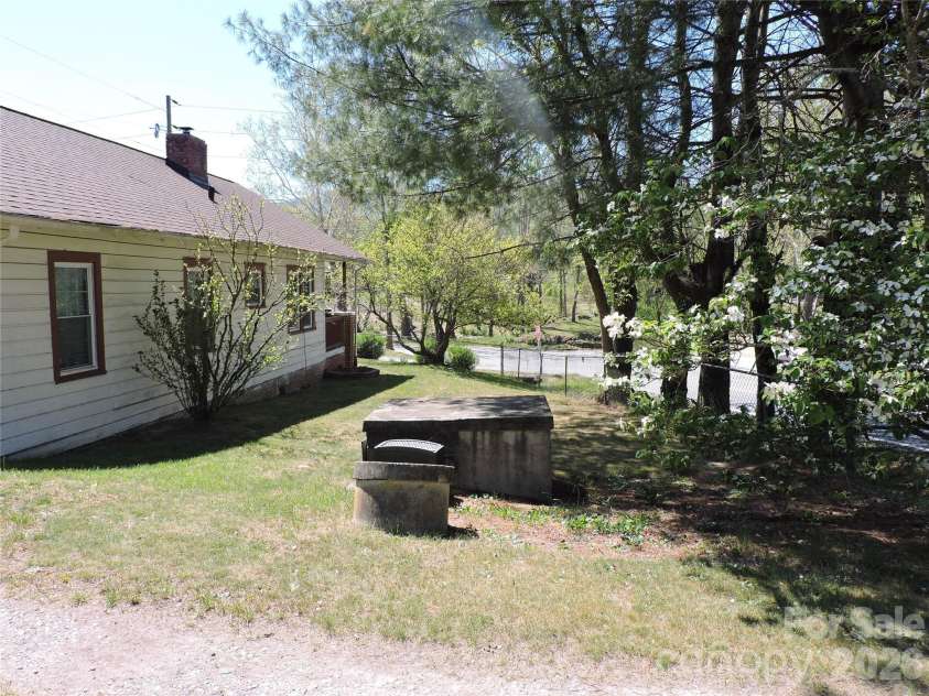 4 Carter Road, Weaverville, NC 28787.  MLS# CAR4373201, YatesRealty ID 14227. Side view