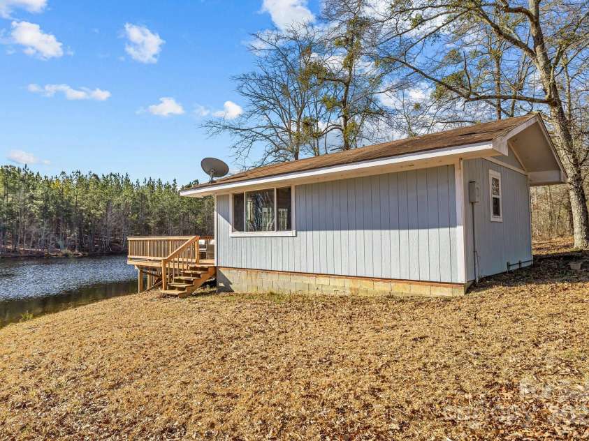 819 Triple Creek Road, Mt Croghan, SC 29727.  MLS# CAR4223278, YatesRealty ID 1423. Cabin (fully functional and livable unit) a few feet away from the main house, right by the pond!