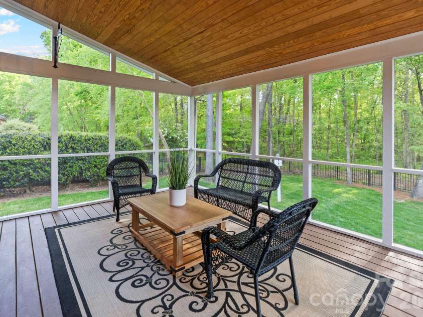 12644 Lahinch Court, Charlotte, NC 28277.  MLS# CAR4364918, YatesRealty ID 14234. Screen in sunroom overlooking the fully fenced backyard