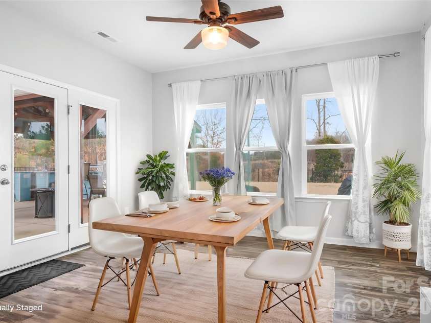 6308 Durango Way, Denver, NC 28037.  MLS# CAR4336580, YatesRealty ID 14236. Breakfast area/Sun room area off kitchen virtually staged