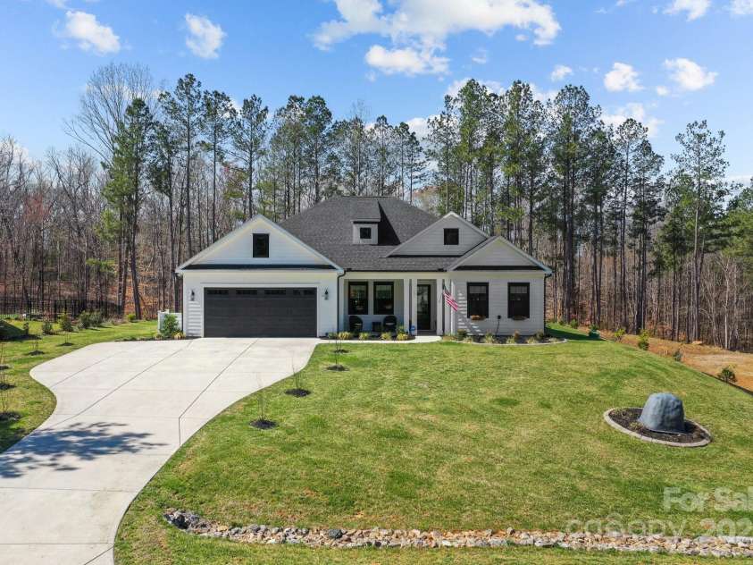 151 Powder Spring Drive, Statesville, NC 28677.  MLS# CAR4238124, YatesRealty ID 14238. Long driveway widened for 3 cars