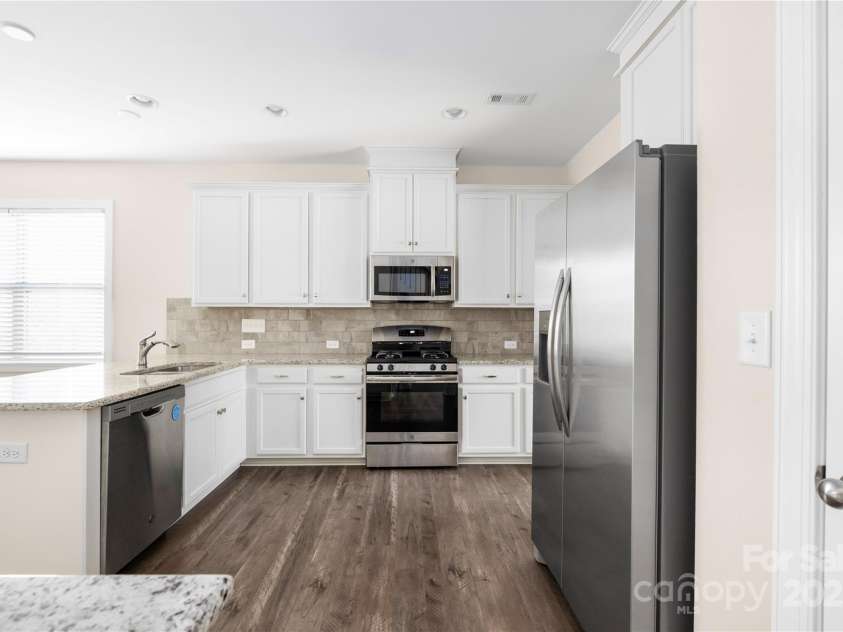 9026 Raven Top Drive, Mint Hill, NC 28227.  MLS# CAR4316455, YatesRealty ID 14246. Stainless appliances and a new refrigerator (10/25)