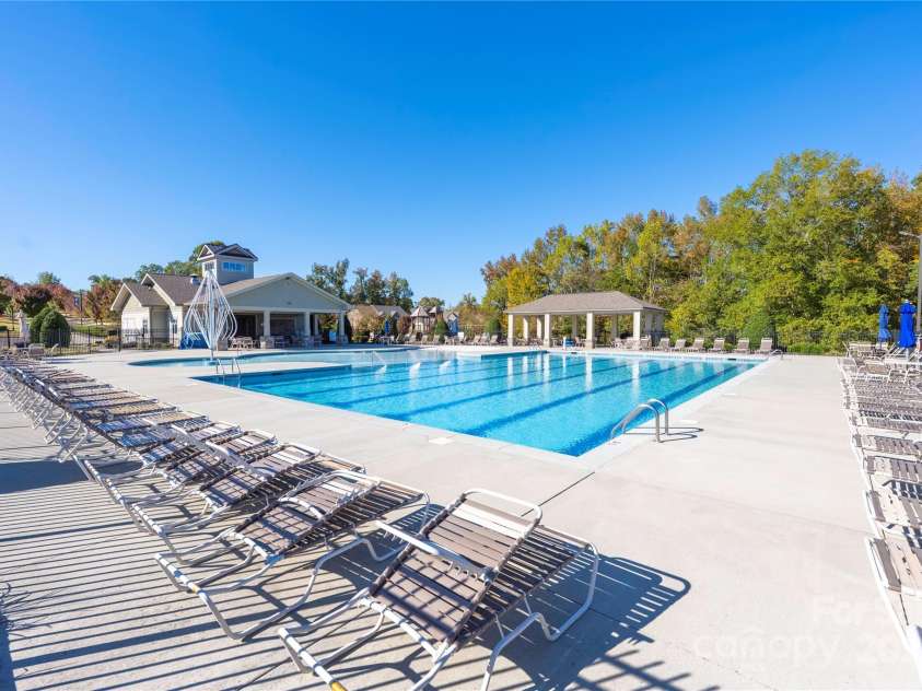 9026 Raven Top Drive, Mint Hill, NC 28227.  MLS# CAR4316455, YatesRealty ID 14246. Summerwood neighborhood amenties are wonderful!  Large pool with lots of pool deck and seating, club house, walking trails, and a playground.