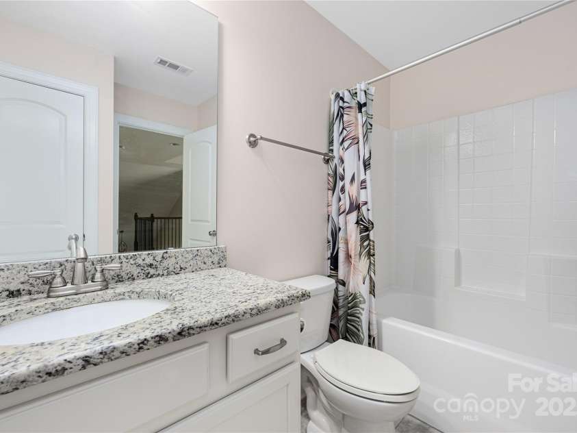 9026 Raven Top Drive, Mint Hill, NC 28227.  MLS# CAR4316455, YatesRealty ID 14246. Upstairs full bathroom.