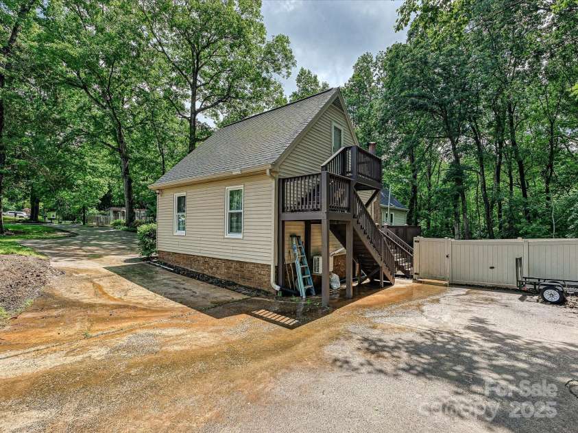 2437 Woodleigh Drive, Gastonia, NC 28056.  MLS# CAR4255182, YatesRealty ID 14250. Back of Garage/ Extra Driveway