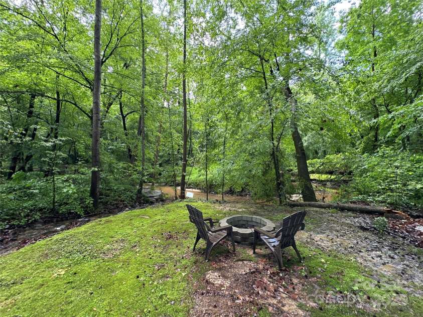 2437 Woodleigh Drive, Gastonia, NC 28056.  MLS# CAR4255182, YatesRealty ID 14250. Fire Pit by Creek