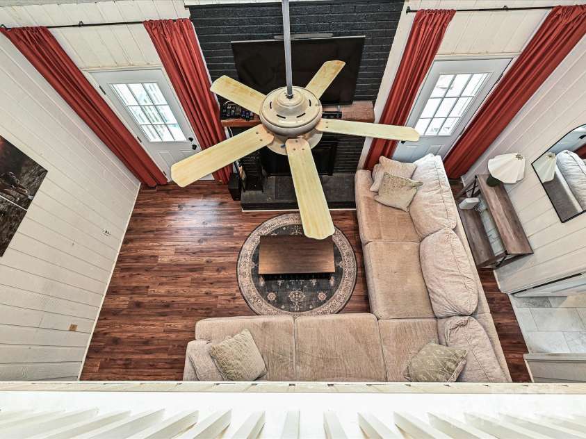 2437 Woodleigh Drive, Gastonia, NC 28056.  MLS# CAR4255182, YatesRealty ID 14250. Great Room from Landing above.