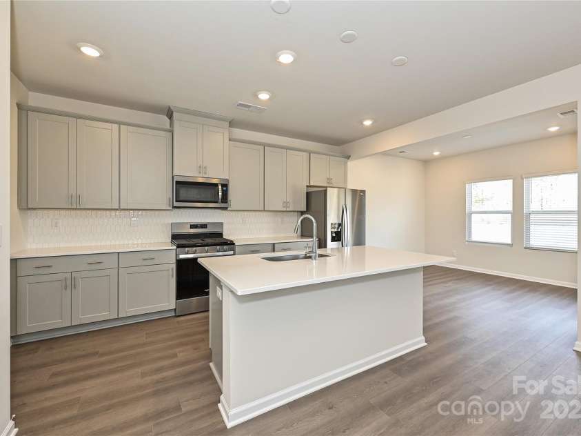 1425 Wildflower Street, Newton, NC 28658.  MLS# CAR4254727, YatesRealty ID 14256. Photo is not of the actual home, but is an inspirational photo of builder’s model home and may depict options, furnishings, and/or decorator features that are not included