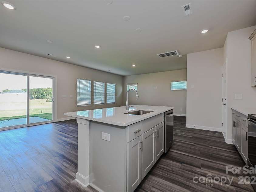 1420 Wildflower Street, Newton, NC 28658.  MLS# CAR4255296, YatesRealty ID 14259. Photo is not of the actual home, but is an inspirational photo of builder’s model home and may depict options, furnishings, and/or decorator features that are not included