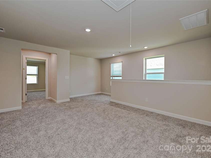 1420 Wildflower Street, Newton, NC 28658.  MLS# CAR4255296, YatesRealty ID 14259. Photo is not of the actual home, but is an inspirational photo of builder’s model home and may depict options, furnishings, and/or decorator features that are not included