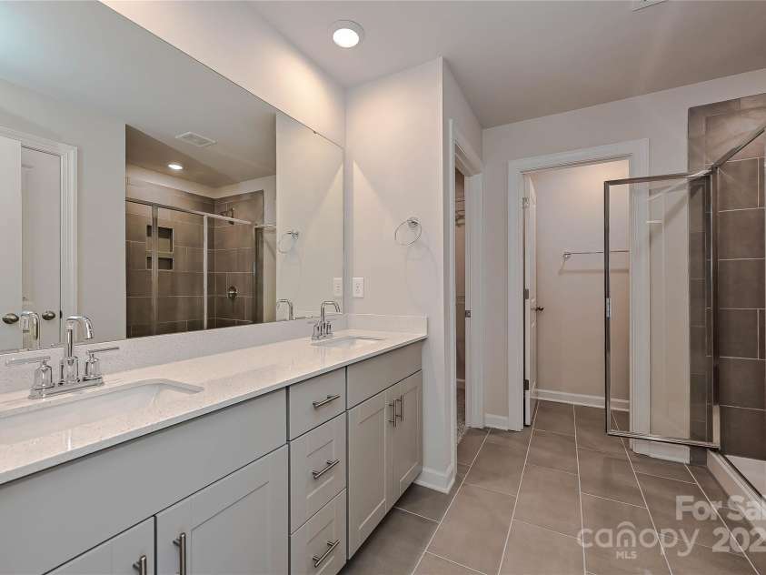 1420 Wildflower Street, Newton, NC 28658.  MLS# CAR4255296, YatesRealty ID 14259. Photo is not of the actual home, but is an inspirational photo of builder’s model home and may depict options, furnishings, and/or decorator features that are not included