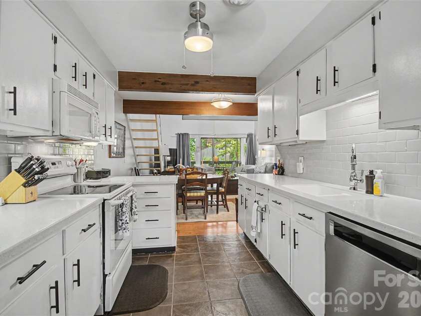 8 Lakemoor Lane, Hendersonville, NC 28739.  MLS# CAR4345671, YatesRealty ID 14259. Galley Kitchen