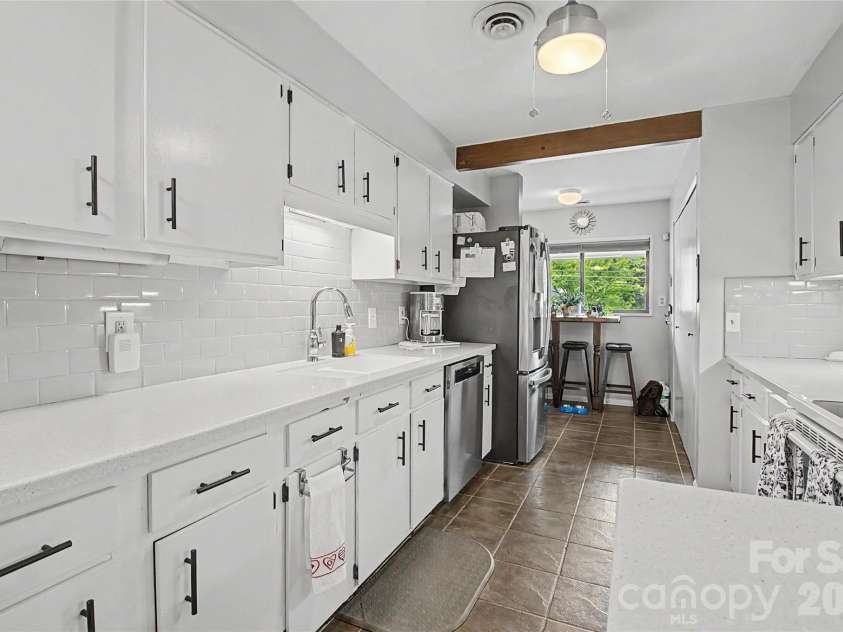 8 Lakemoor Lane, Hendersonville, NC 28739.  MLS# CAR4345671, YatesRealty ID 14259. Galley Kitchen