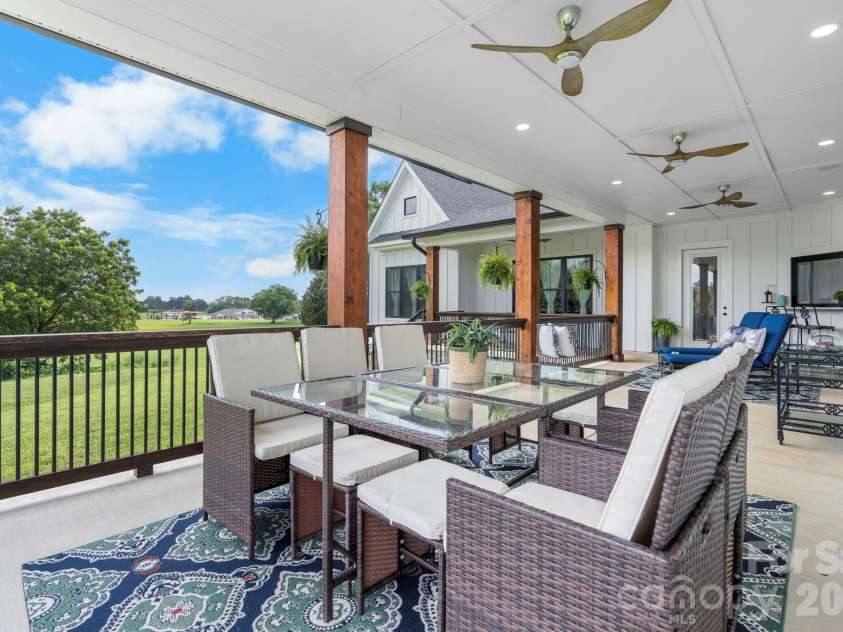 5780 Hwy 10 Highway, Hickory, NC 28602.  MLS# CAR4355019, YatesRealty ID 14260. Back covered porch