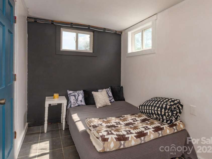 2906 Rabbit Skin Road, Waynesville, NC 28785.  MLS# CAR4183385, YatesRealty ID 14265. Bedroom in Basement