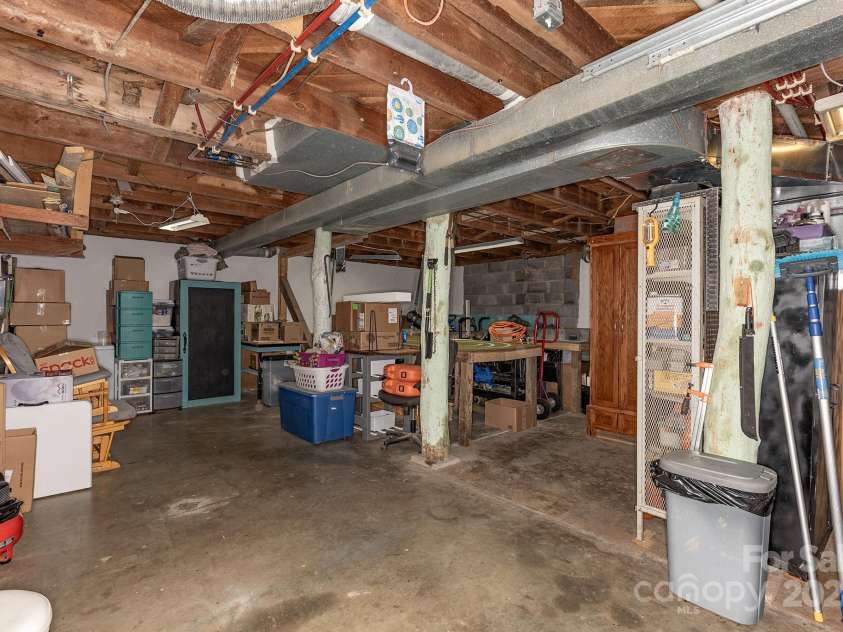 2906 Rabbit Skin Road, Waynesville, NC 28785.  MLS# CAR4183385, YatesRealty ID 14265. Garage/Large room in basement