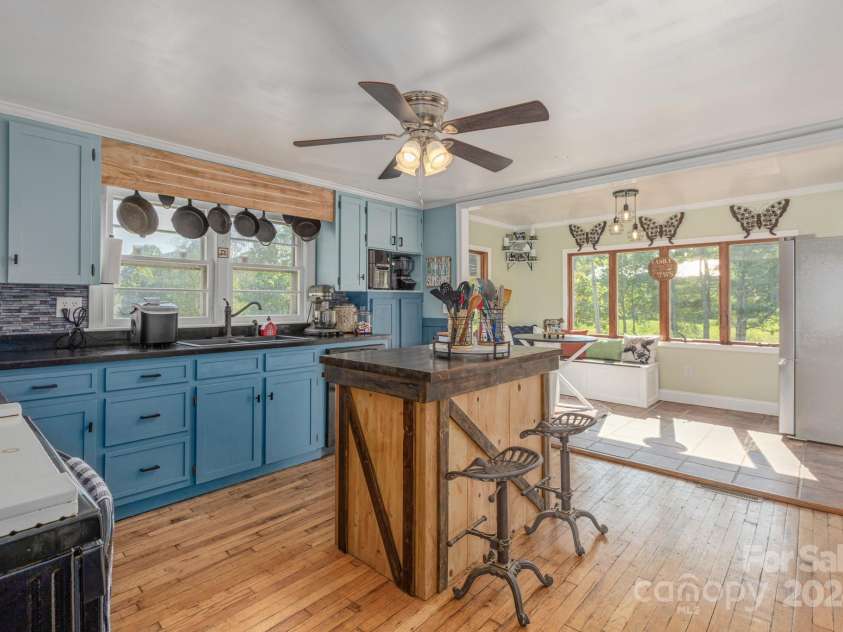 2906 Rabbit Skin Road, Waynesville, NC 28785.  MLS# CAR4183385, YatesRealty ID 14265. Kitchen from Living room
