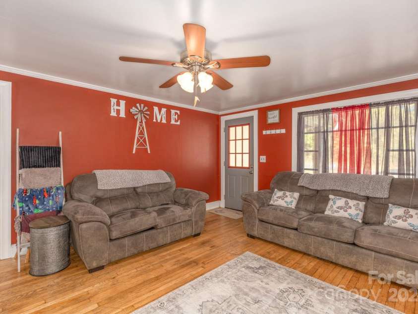 2906 Rabbit Skin Road, Waynesville, NC 28785.  MLS# CAR4183385, YatesRealty ID 14265. Living Room from Kitchen