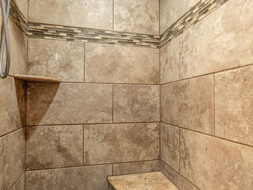 2906 Rabbit Skin Road, Waynesville, NC 28785.  MLS# CAR4183385, YatesRealty ID 14265. Tile Shower