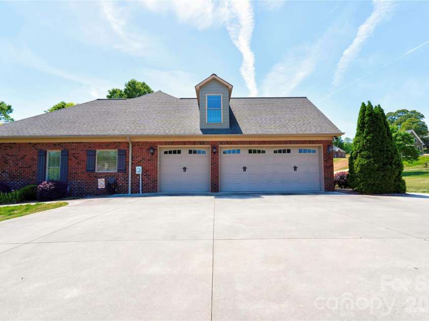 207 Cross Creek Drive, Cherryville, NC 28021.  MLS# CAR4373170, YatesRealty ID 14266. Left Side